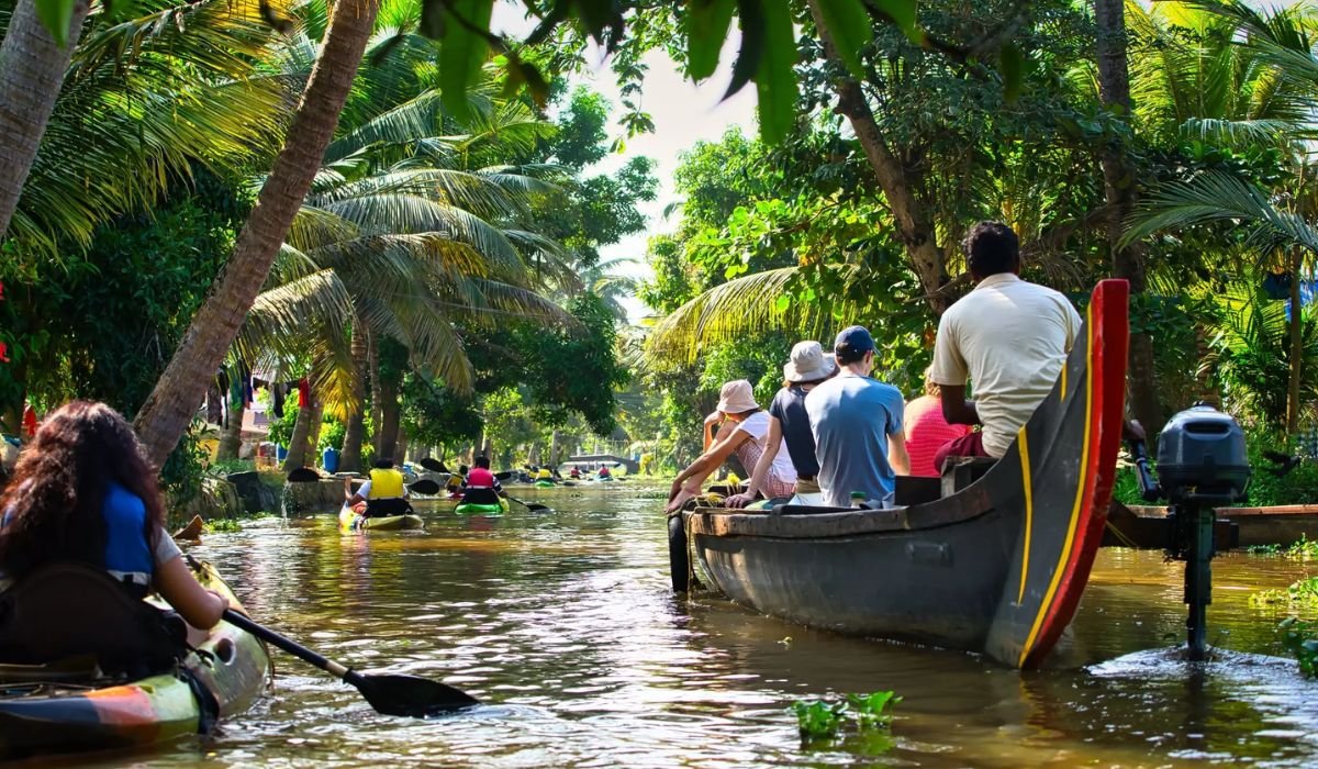 Luxury houseboat cruising through Kerala backwaters